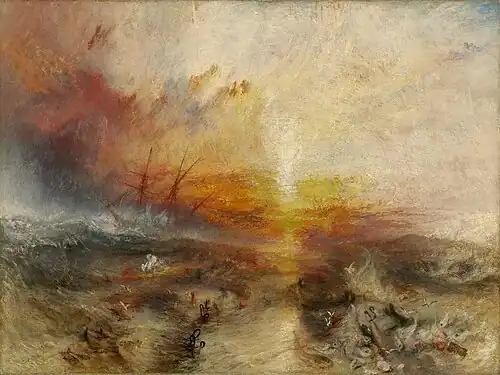 A painting entitled "The Slave Ship" by J. M. W. Turner. In the background, the sun shines through a storm while large waves hit the sides of a sailing ship. In the foreground, slaves are drowning in the water, while others are being eaten by large fish