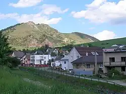 The village church with ruins of Kamenicky hrad in the background.