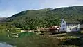 View of boathouses along the fjord