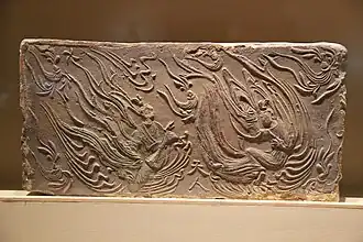 Flying immortals on Liu Song dynasty stone-relief