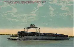 Postcard photo of the Southern Pacific railroad barge Mastodon crossing the Mississippi River at Avondale, Louisiana. The railroad also had railroad ferries which worked in the San Francisco area for the same purpose.