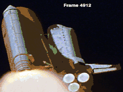 Video image of the Space Shuttle in flight during the debris strike.