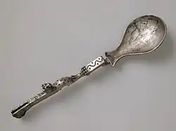 Silver-plated fancy bronze spoon with a panther, Roman, 3rd-4th century, found in France