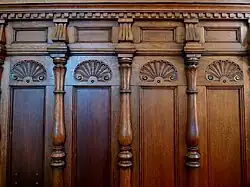 Dado in carved oak, designed by W. S. Barber at Spring Hall, Halifax