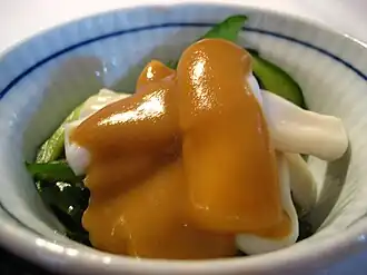 Miso on cucumber and squid salad