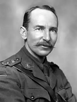 black and white portrait of a male in uniform