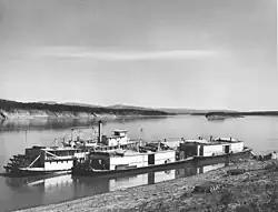 The S.S. Mackenzie River and three barges tied up at Fort Wrigley in 1946