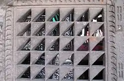 Lattice work in stone window