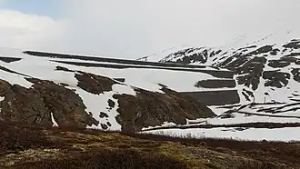 The snow-covered dam in June 2015