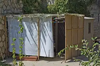 Palm fronds placed atop a sukkah, the temporary hut constructed for the Jewish festival of Sukkot.