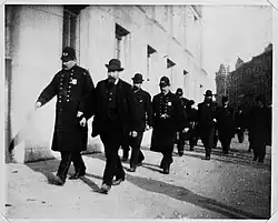 Officers of the New York City Police Department wearing helmets in Brooklyn, circa 1872–1887.