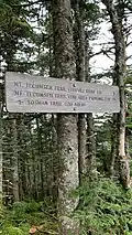 A sign on the trail up to the summit of Mt. Tecumseh.
