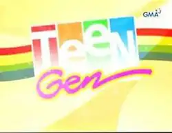 An image with a yellow background and strips of different colors. The series title is displayed on the center of the image. The logo of GMA Network is displayed on the upper right side of the image.