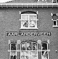 Aarlanderveen station tile sign