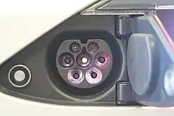 Type 2-compatible 120&nbsp;kW male vehicle inlet on European Tesla Model S