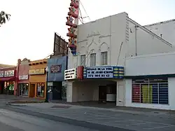 A replica marquee, added c. 2006, and restored facade in 2008