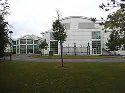 New building with preserved gates from the original entrance on Queen's Road