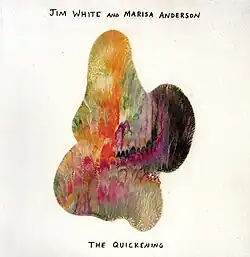 A multicolored, abstract shape on an off-white background.