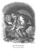 Man in a sewer tunnel panning for valuable objects