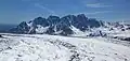The north side of Tokosha Mountains seen flying over Ruth Glacier