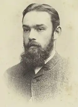 Tom Carrington, aged in his mid-twenties.