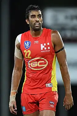 Tom Nicholls playing for Gold Coast in 2019