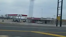 Gas station and closed restaurant at junction with Highway 7