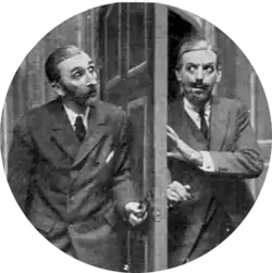 two men peering cautiously at each other from either side of a door