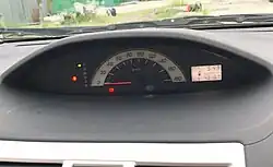 A simpler instrument cluster without tachometer for base model Belta and Yaris sedan