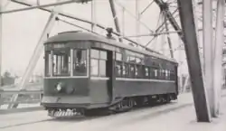 Tram on the Frank J. Woods Bridge