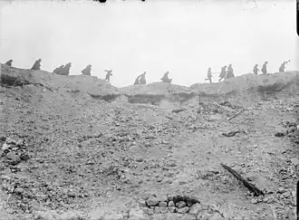 Troops passing Lochnagar Crater, October 1916 (IWM Q 1479)