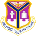Old emblem, USAF Chaplain School, Christian and Jewish symbols, Hebrew letters, motto replaced with school title, 1984