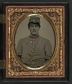 Unidentified artilleryman wearing secession badge