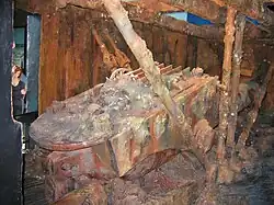 Photo showing recovery of turret as it hoisted up and breaks the surface