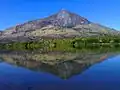 Ibituruna mountain reflection on Rio Doce river