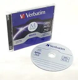 A Verbatim M-Disc BDXL 100GB in front of the jewel case