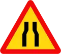 203a: Road narrows ahead on both sides
