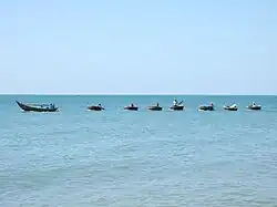 Being towed to the fishing ground.