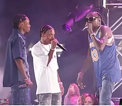 Vybz Kartel with his sons 'Likkle Vybz' and 'Likkle Addi' at 'Freedom Street' concert