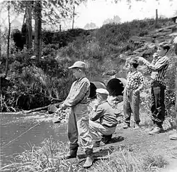 Fishing at the old mill pond on Young’s Creek; photo taken spring 1958.