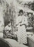 Empress Consort Wanrong and a friend in the Zhang Garden