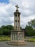 The war memorial was designed c. 1920 by Charles Nicholson[6][10]