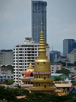 The temple's stupa, with Komtar in the background.