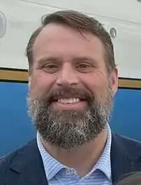 Britt being sworn in by Kamala Harris on January 3, 2023.