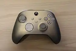 An Xbox Wireless controller in the Lunar Shift variant.