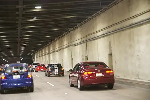 Lower deck of Yerba Buena Tunnel showing "deadman" holes on south side (2013)