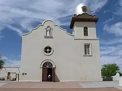 Adobe church with small bell tower