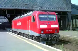 Red locomotive with Railion logo on the side